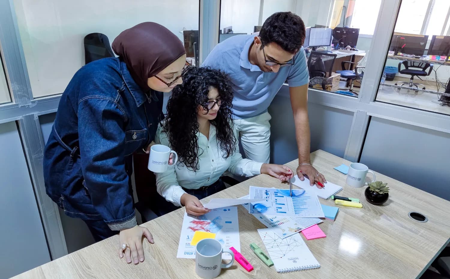 Team members collaborating on a project